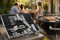 BBQ tool set at backyard party